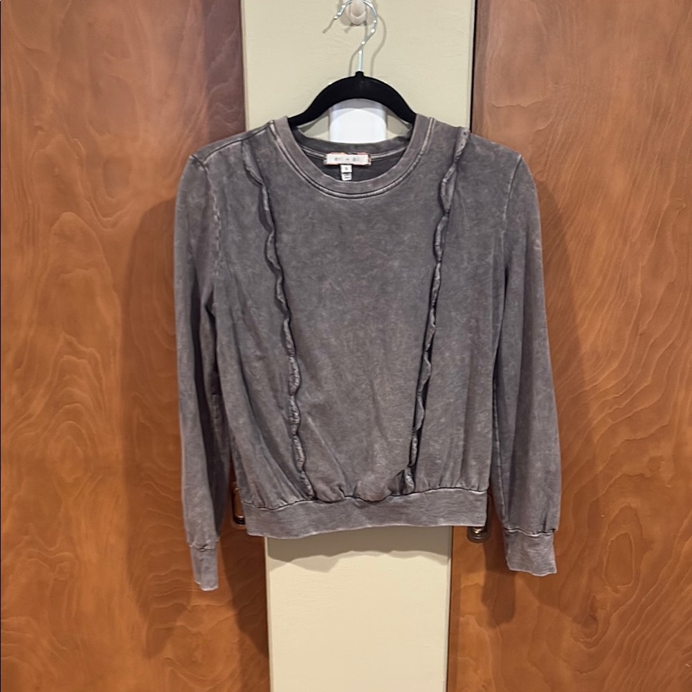 Anthropology ruffled crewneck sweatshirt.